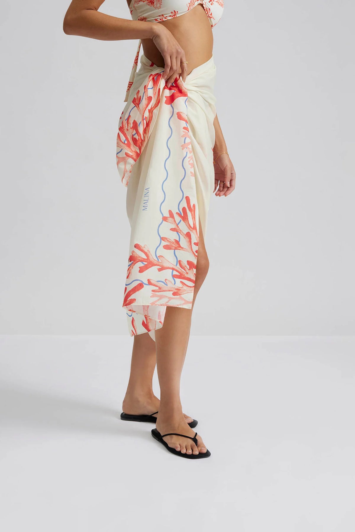 Ecru and red coral print beach wrap with blue border