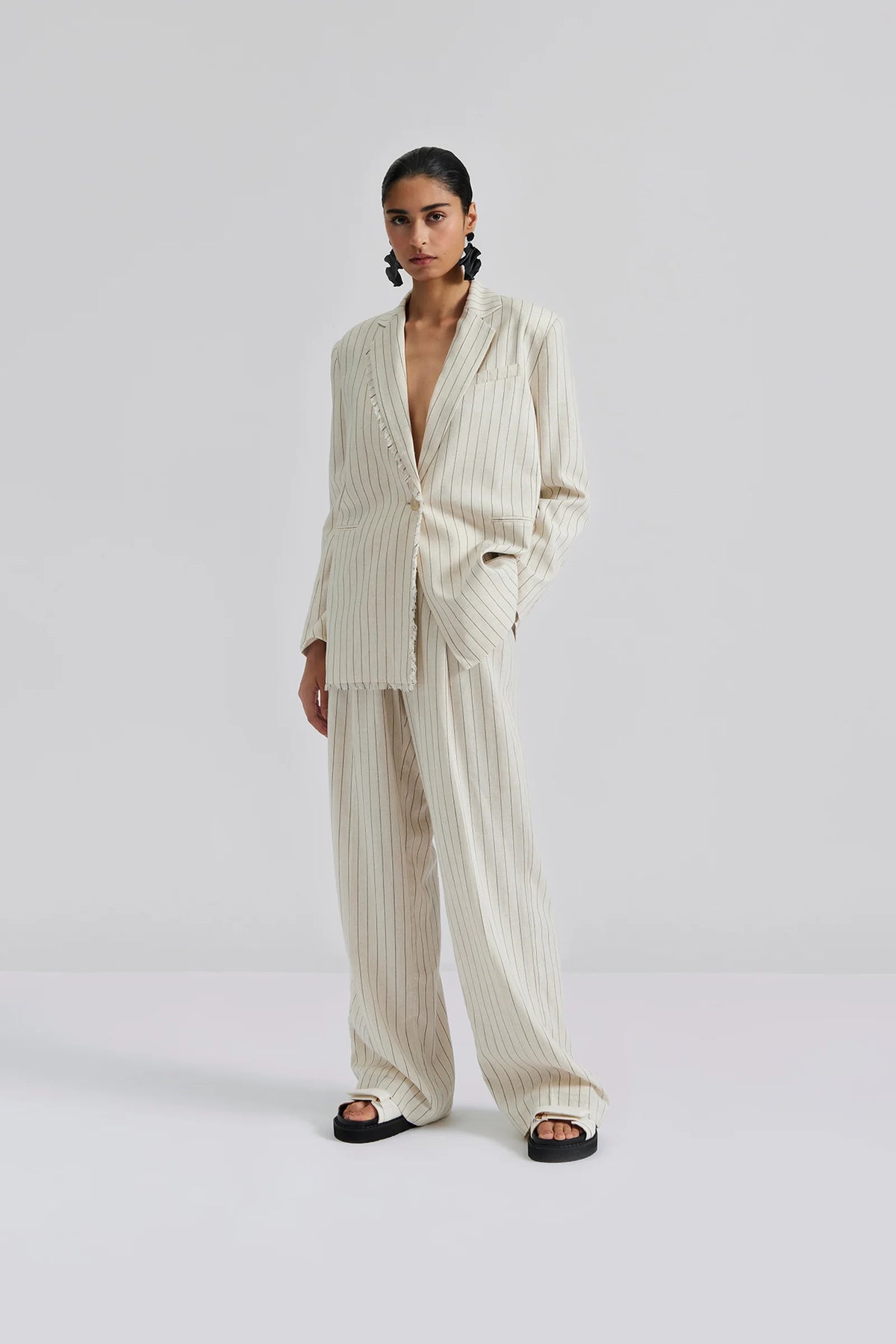 Natural linen and black pinstripe single breasted singe button fastened blazer with fringe detail