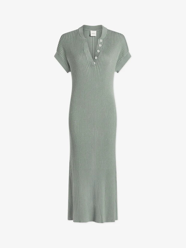 Soft light green ribbed knitted cotton dress with short grown on sleeves and notch neckline with aesthetic button details figure hugging