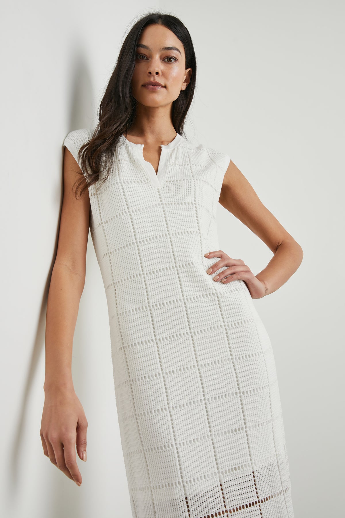 Sleeveless crochet dress with grid detailing and a notch neck
