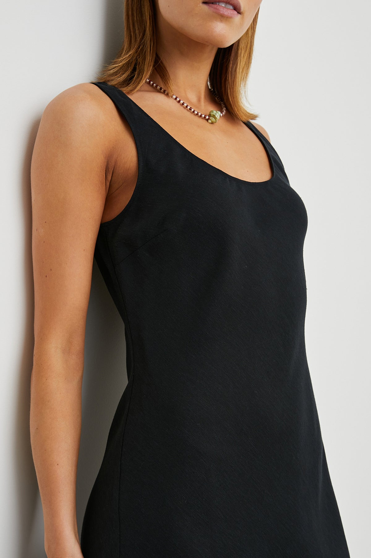 Black sleeveless dress with side split