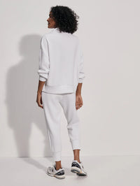 White half zip doublesoft sweatshirt with silver hardware and turtleneck