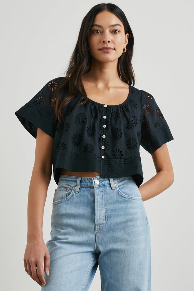 Daisy style broderie anglais top in black with short sleeves and a scoop neck