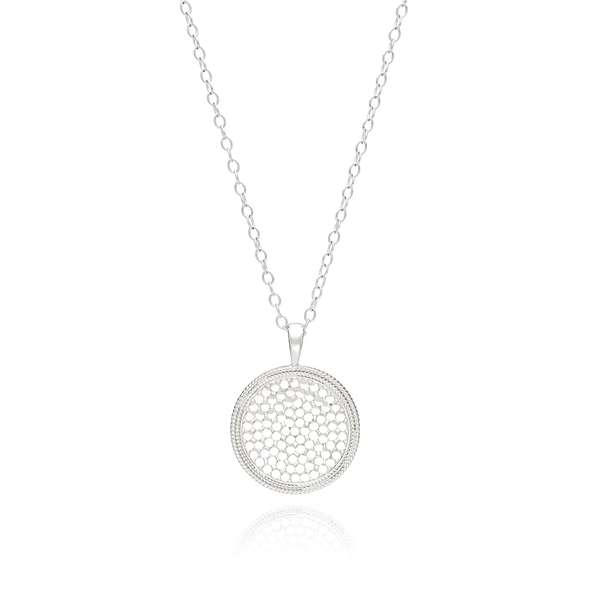 long silver chain necklace with a large sterling silver medallion pendant
