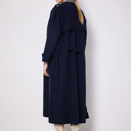 Rear view of navy knitted trench