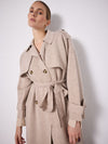 Beige knitted trench coat on model