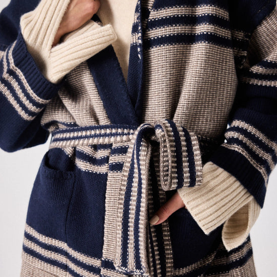 Stripe knit cardigan in navy and beige with tie belt close up