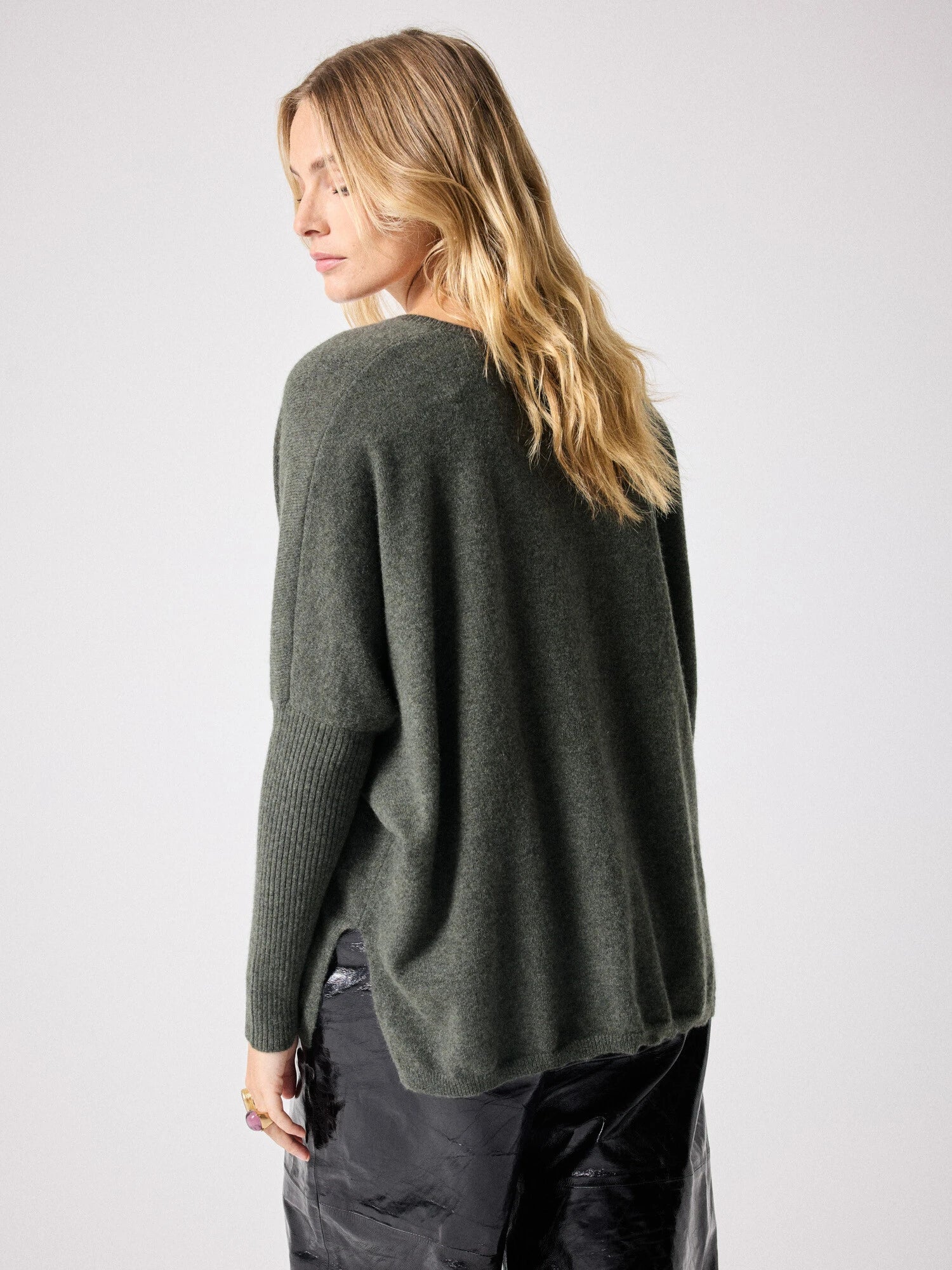 Dark green deep V cashmere knit with boxy fit rear view