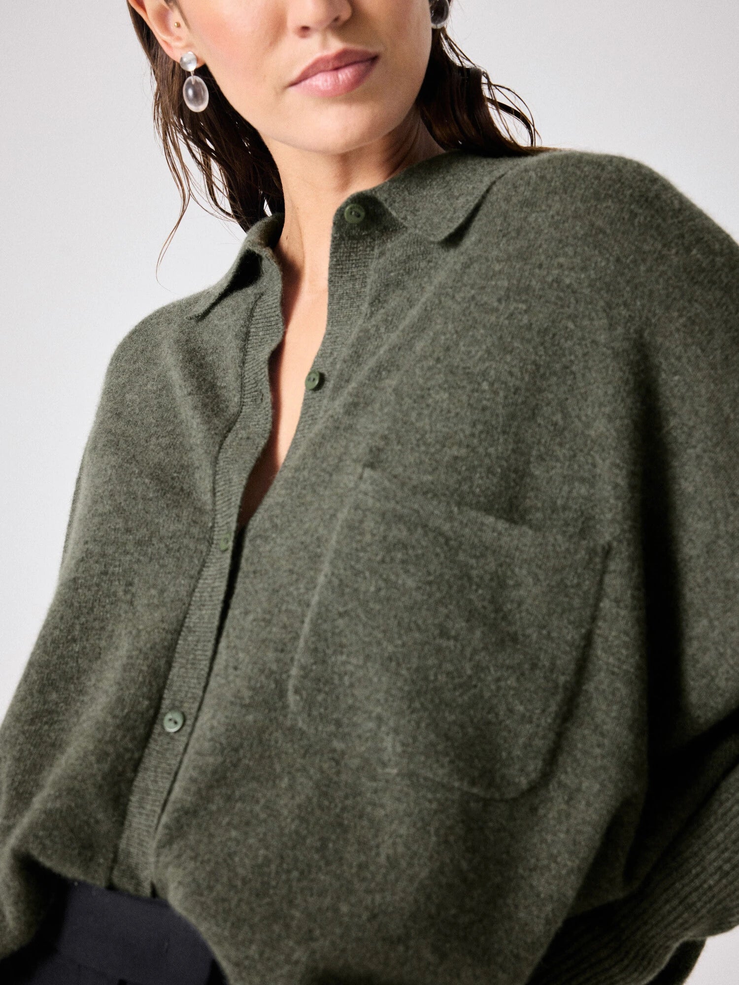 Button through cashmere knit with a collar and chest pocket