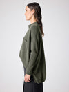 Button through cashmere knit with a collar and chest pocket side view