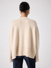 beige cashmere knit with ribbed neck and split cuffs  rear view