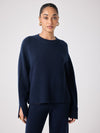 navy cashmere knit with round ribbed neck and split cuffs  model shot