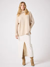 long sleeved roll neck beige jumpe