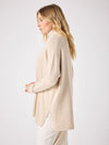 long sleeved roll neck beige jumpe