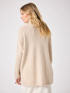 long sleeved roll neck beige jumpe