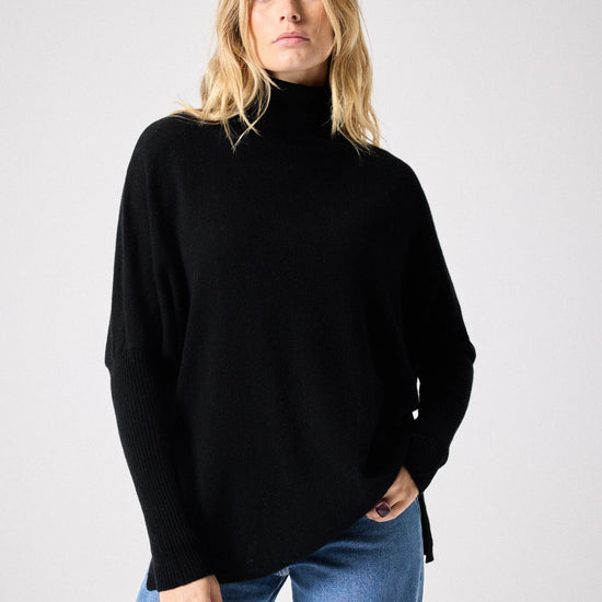 Black cashmere roll neck jumper