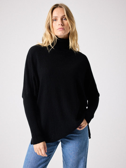 Black cashmere roll neck jumper