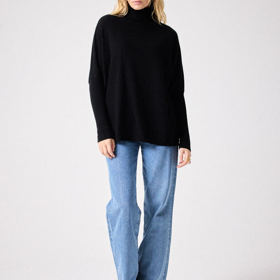 Black roll neck cashmere jumper