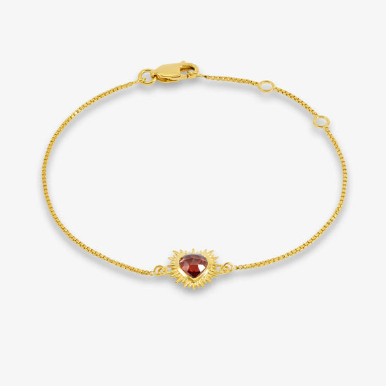 gold bracelet with spiky heart with red stone inside and lobster clasp from rachel jackson