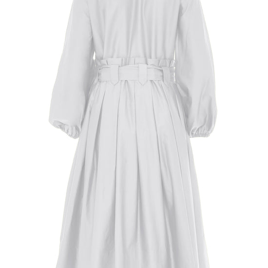 White midi dress with half placket full skirt long sleeves collar and statement box pleats at waist and belt loops