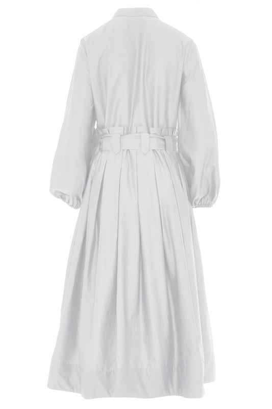 White midi dress with half placket full skirt long sleeves collar and statement box pleats at waist and belt loops