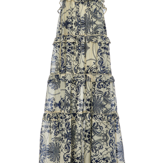 Long tiered maxi dress with ruffles in a navy and ecru willow inspired print