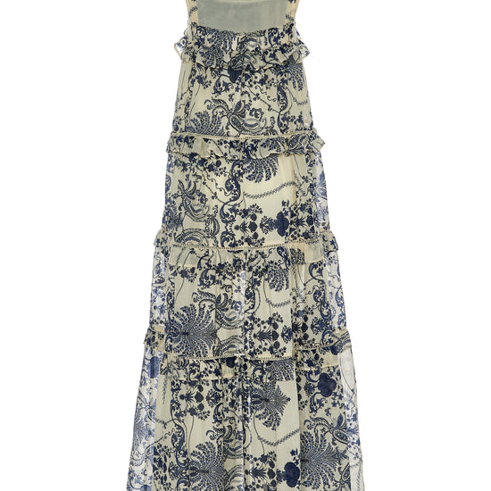 Long tiered maxi dress with ruffles in a navy and ecru willow inspired print