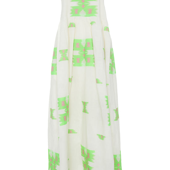 Ecru midi dress with empire line and spaghetti straps that cross at the back with green and pink abstract woven design throughout