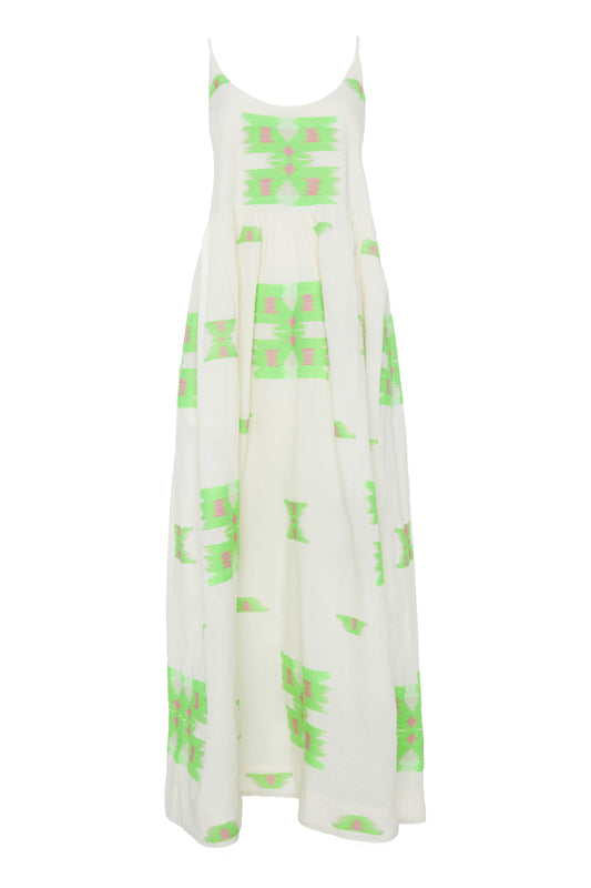 Ecru midi dress with empire line and spaghetti straps that cross at the back with green and pink abstract woven design throughout