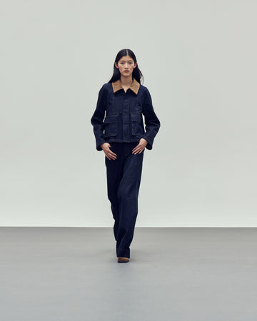 dark blue denim jacket with brown collar