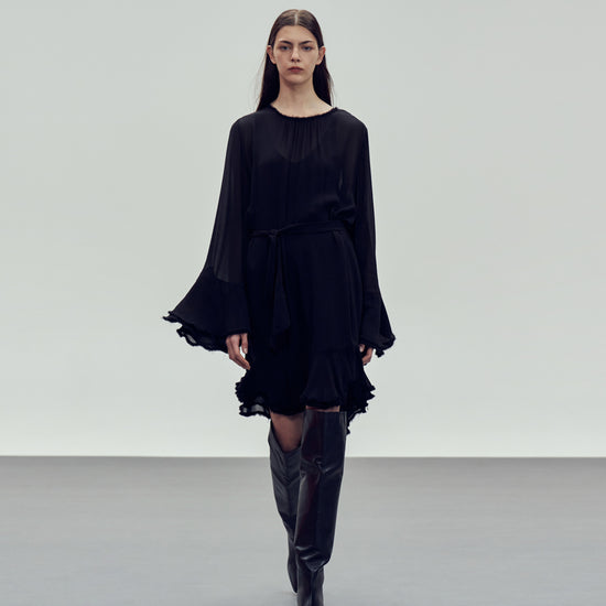 black viscose top with blouson sleeves and frill hem