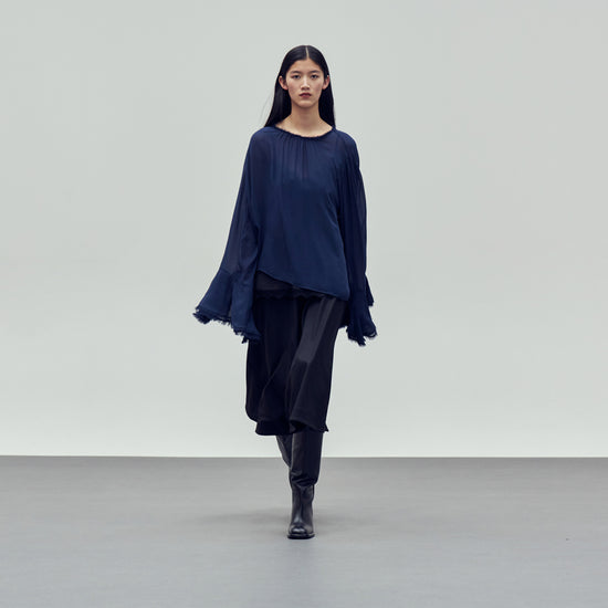 Blue round neck top with ruffled sleeves