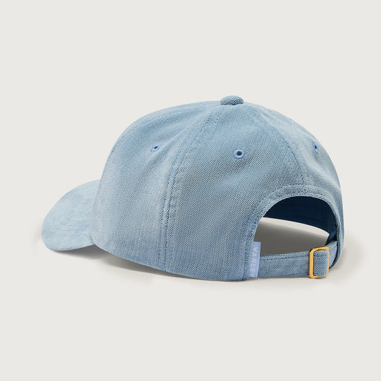 light blue baseball cal with adjustable tab  rear view