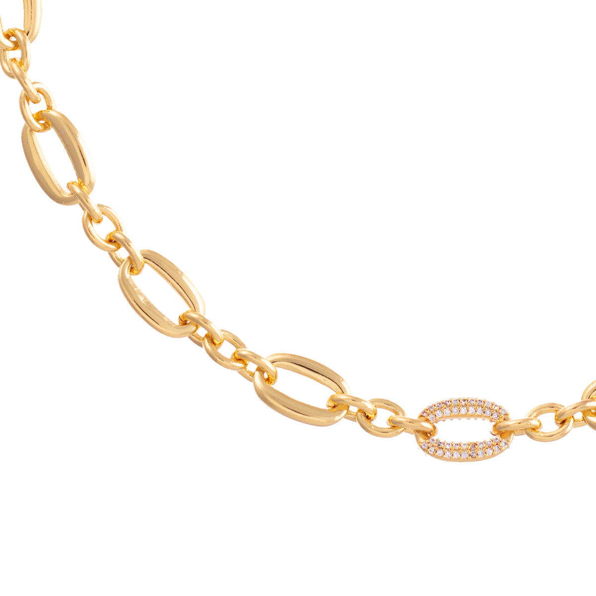 gold chain necklace with single cubic zirconia link close up
