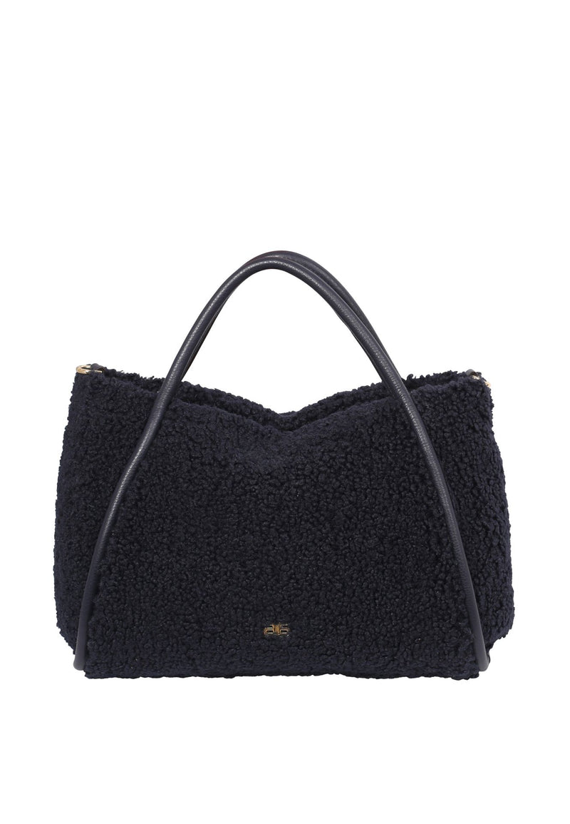 navy shearling bag with shoulder strap and optional cross body strap