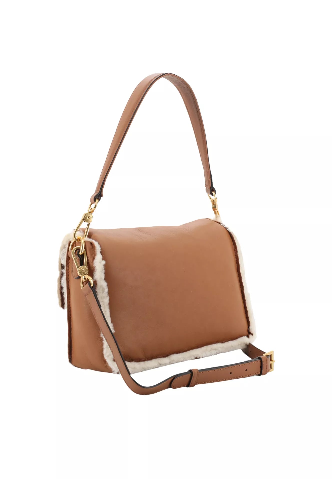 tan leather cross body leather bag with top handle and white shearling interior and edging from abro rear view