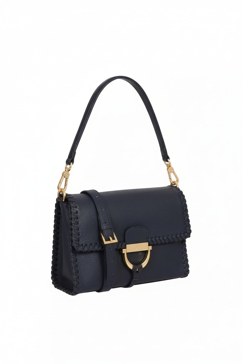 navy blue leather handbag with gold toned hardwear