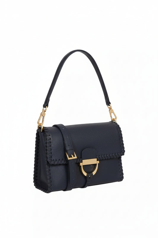 navy blue leather handbag with gold toned hardwear