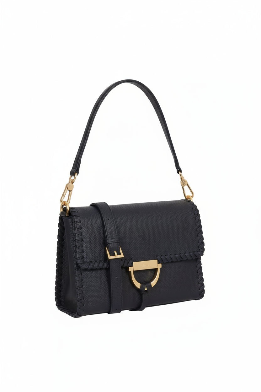 navy leather handbag with gold toned hardwear