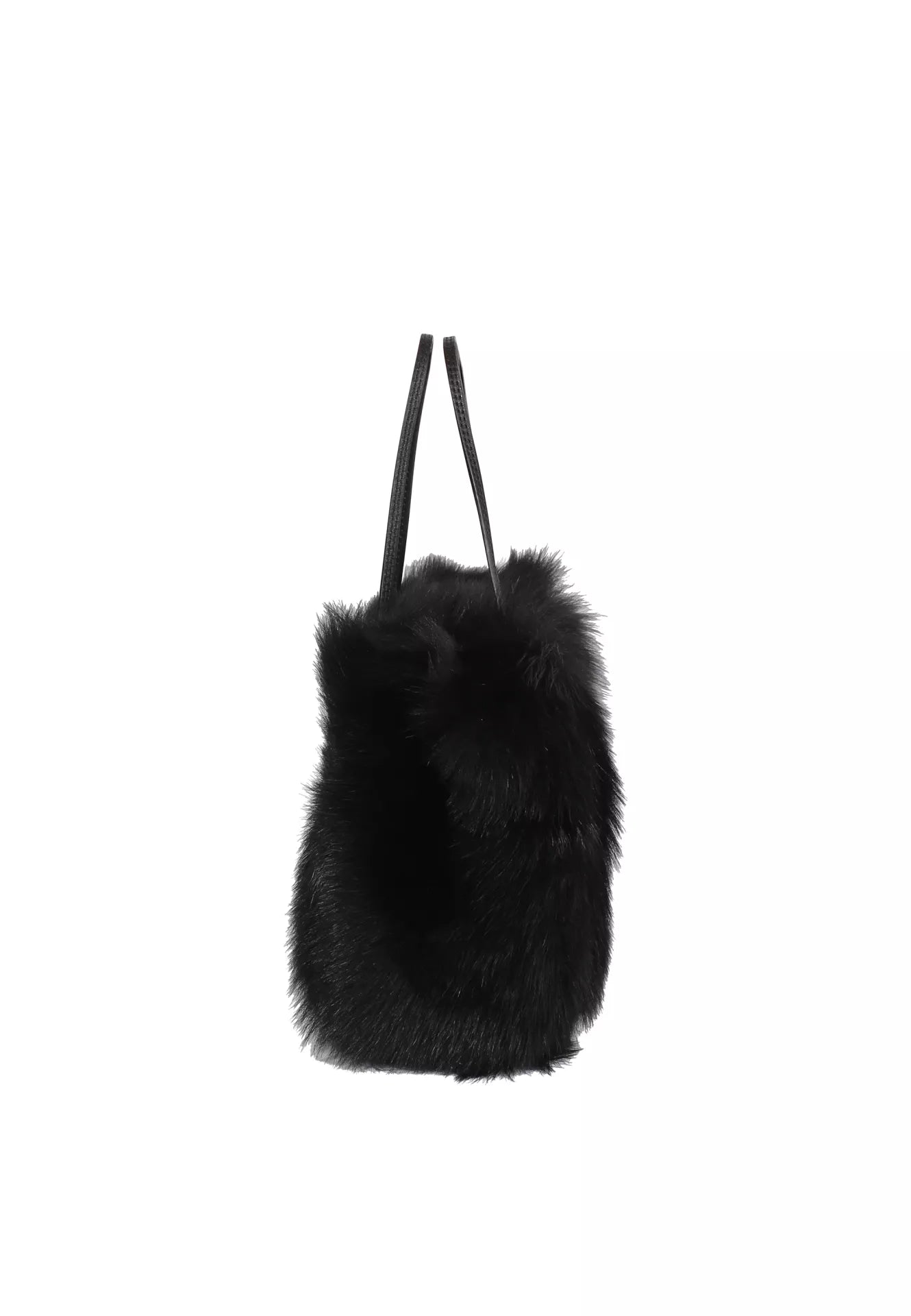 black rectangular small shearling bag with a small top handle and removable cross body strap from abro side view