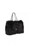 black rectangular small shearling bag with a small top handle and removable cross body strap from abro side view