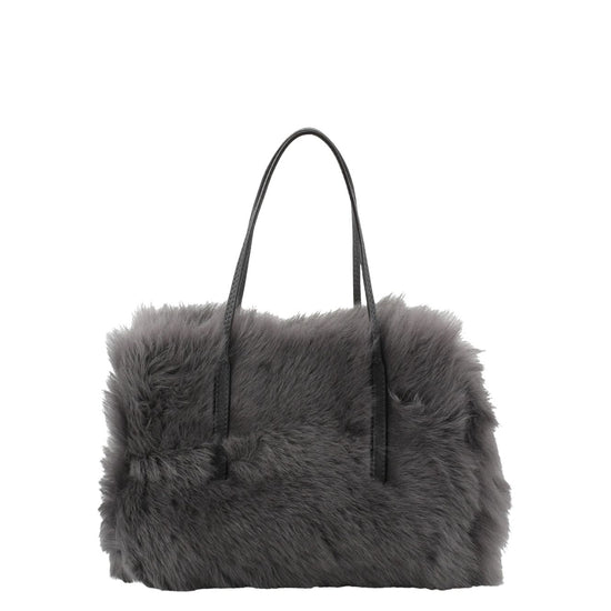 charcoal grey small shearling bag with small top handle and removable crossbody strap from abro
