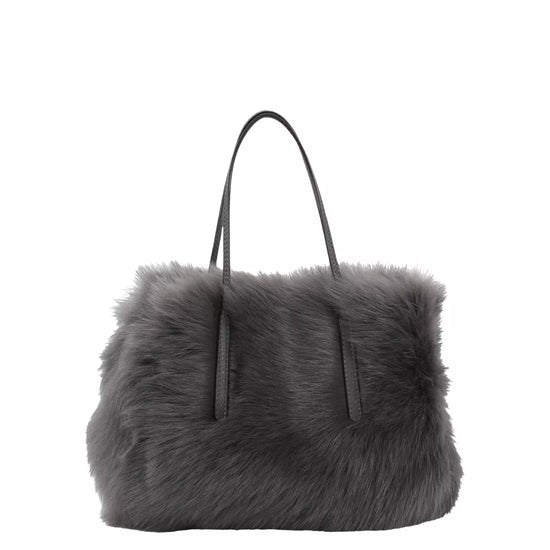 charcoal grey small shearling bag with small top handle and removable crossbody strap from abro
