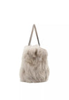 light silvery grey rectangular small shearling bag with small top handle and removable cross body strap from abro side view