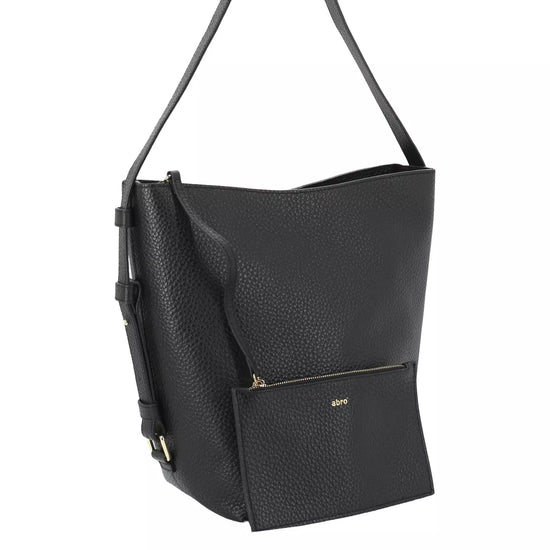 A black pebbled leather shoulder bag with a front zippered pocket and a small gold logo plate, shown on a plain white background.