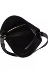 Black leather shoulder bag shown from an overhead angle, displaying its interior with a zippered compartment and a black strap against a white background.