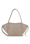 A light taupe pebbled leather handbag with a structured, fan-shaped silhouette, dual top handles, and a thin shoulder strap, shown against a plain white background.