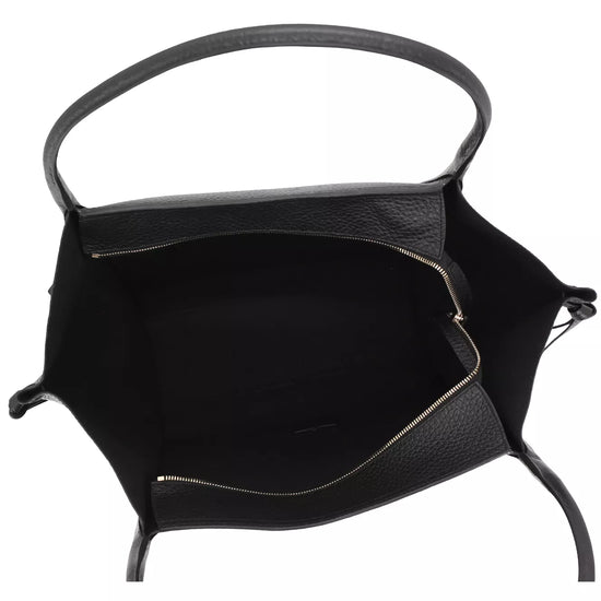 Black leather handbag shown from an overhead angle, highlighting its spacious open interior with a gold-tone zipper and a single top handle on a white background.