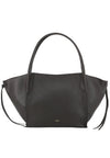 A brown pebbled leather handbag with a structured, asymmetrical silhouette, double top handles, and a small gold 'MNY' logo on the front, set against a plain white background.
