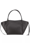 A brown pebbled leather handbag with a structured, wide silhouette, double top handles, and side drawstring tassels, shown against a plain white background.
